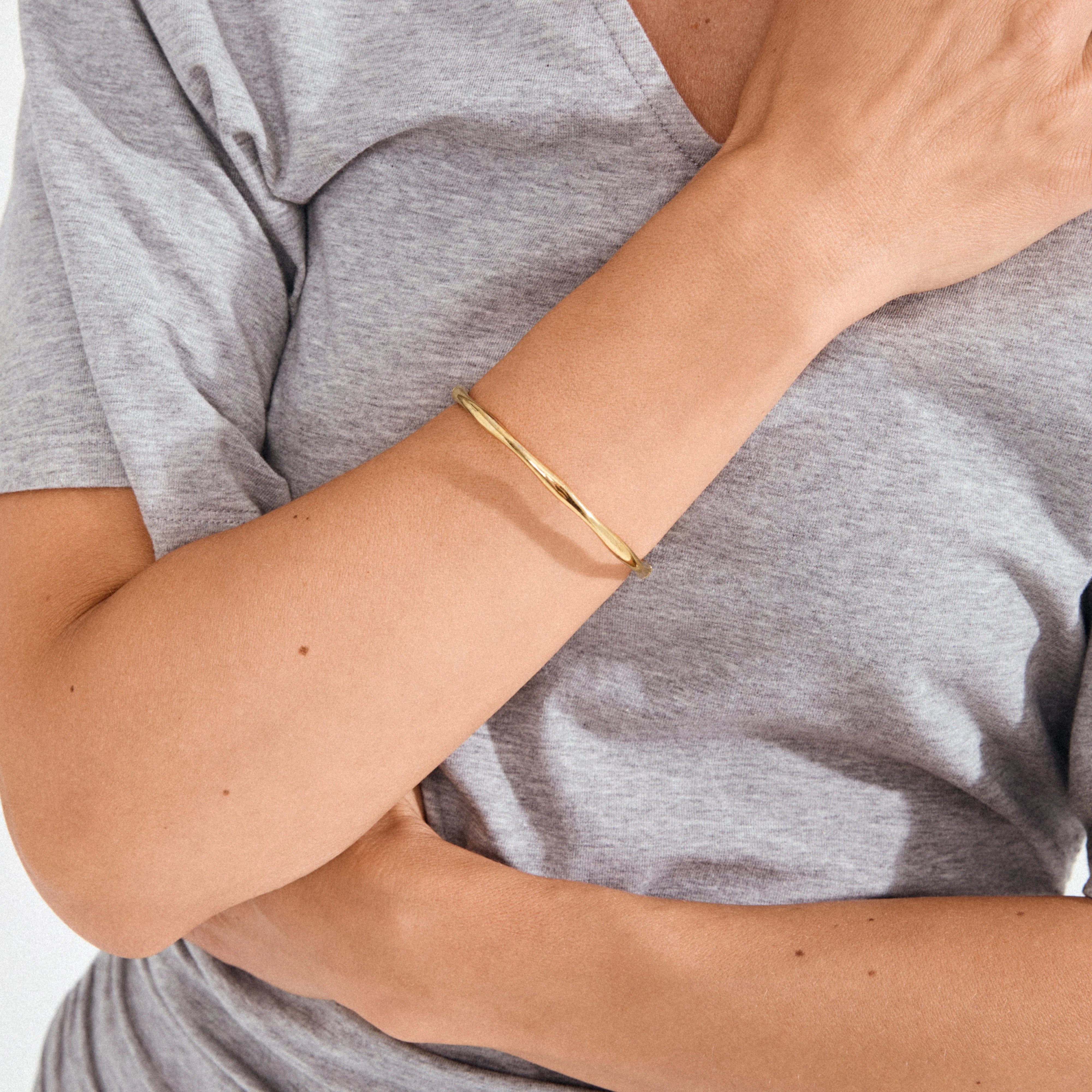 trendy womens bracelet, gold statement bangle, gold fashion jewelry, gold bracelet styling inspiration
