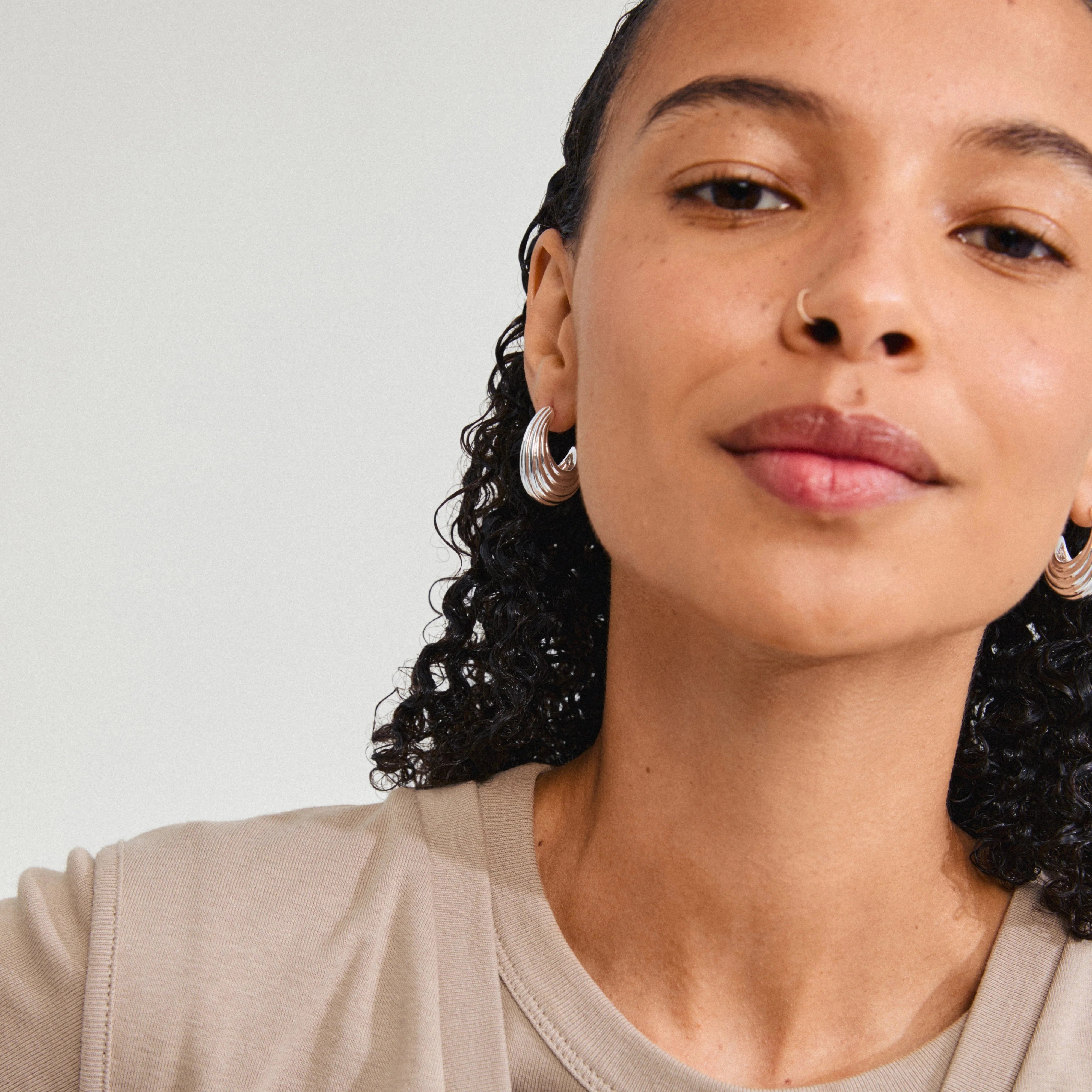 sculpted silver jewelry, textured silver hoops