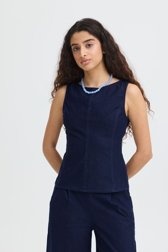 dark blue denim top women, fitted denim top womens, sleeveless denim top women, dark wash denim blouse, chic denim top outfit