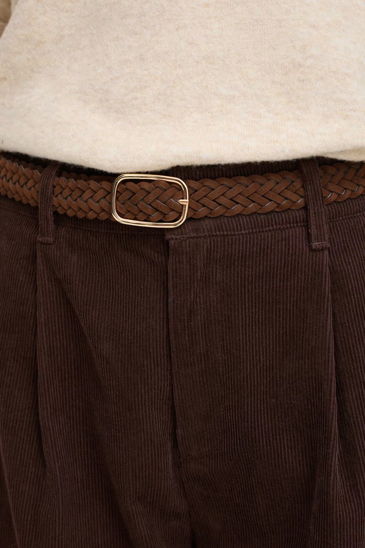 BROWN BRAIDED BELT WITH GOLD BUCKLE ON BROWN PANTS WITH BEIGE WOOL TOP