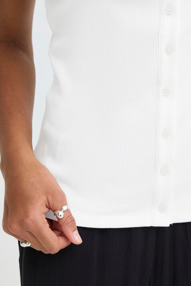 versatile layering top, polished sleeveless blouse, minimal wardrobe staple top