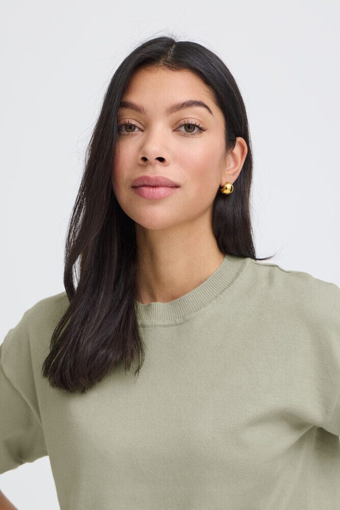 soft fabric knit top, relaxed fit knit top women, olive green top women, versatile knit shirt women, modern basic top women