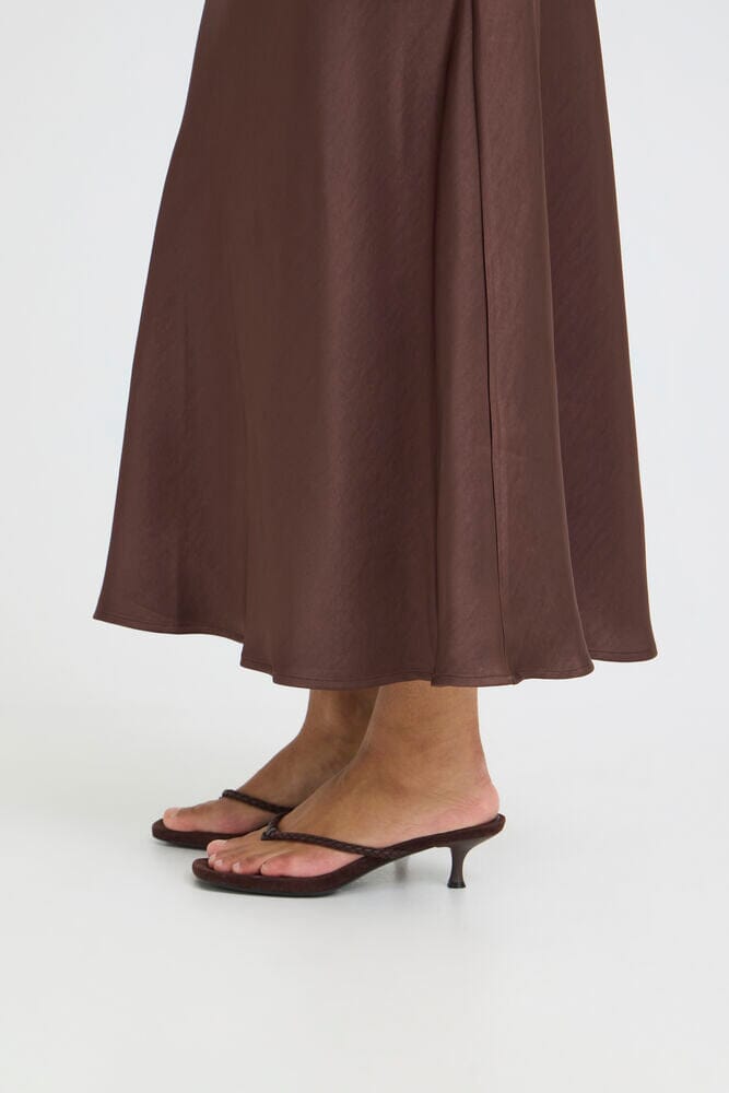 everyday midi skirt brown, polished casual skirt look, fall neutral skirt outfit, versatile midi skirt women, satin skirt with sweater outfit, coffee tone midi skirt