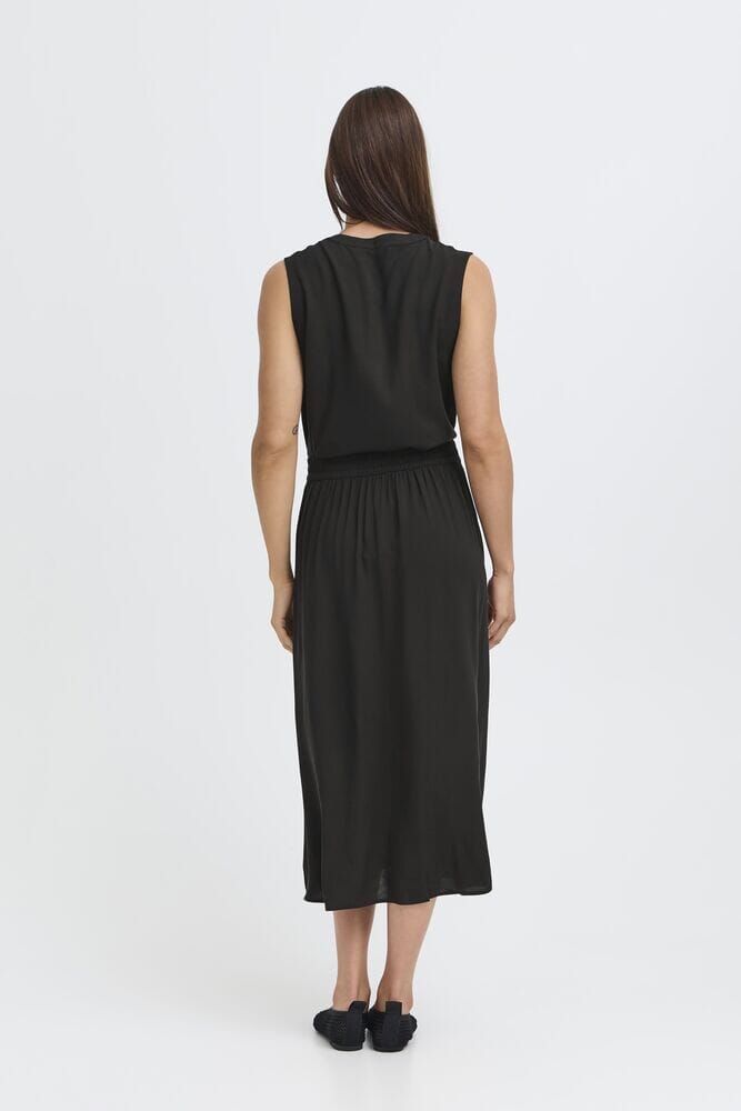 everyday black skirt, elegant black skirt midi, soft drape skirt black, black skirt outfit styling
