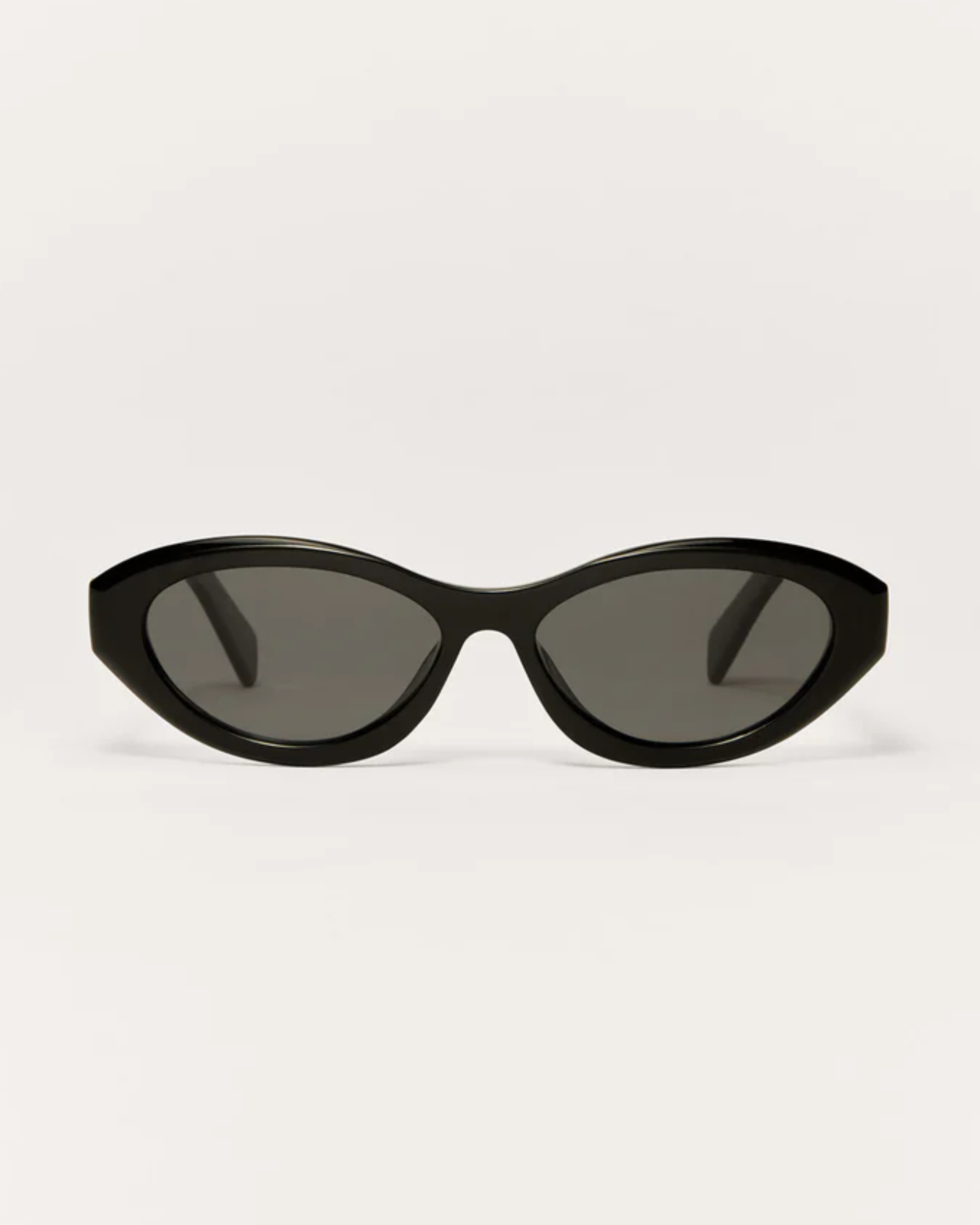 modern women’s eyewear, vacation sunglasses women, statement sunglasses women, minimalist sunglasses women