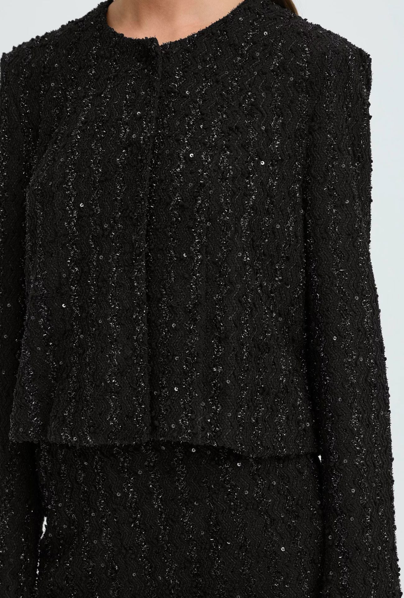 subtle glitter jacket, luxe black sparkle layer