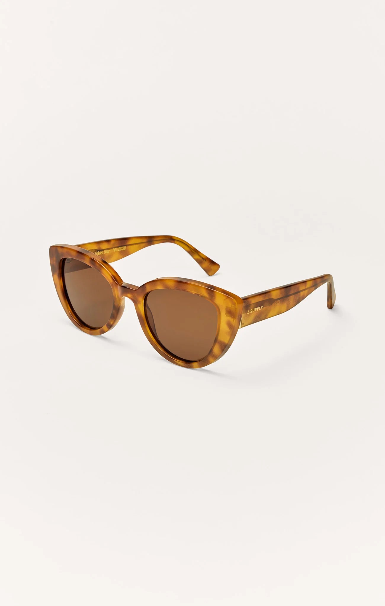 Trendy sunglasses women, oversized cat eye sunglasses, vacation sunglasses women, summer accessories women, chic women’s eyewear, brown sunglasses women, statement sunglasses women