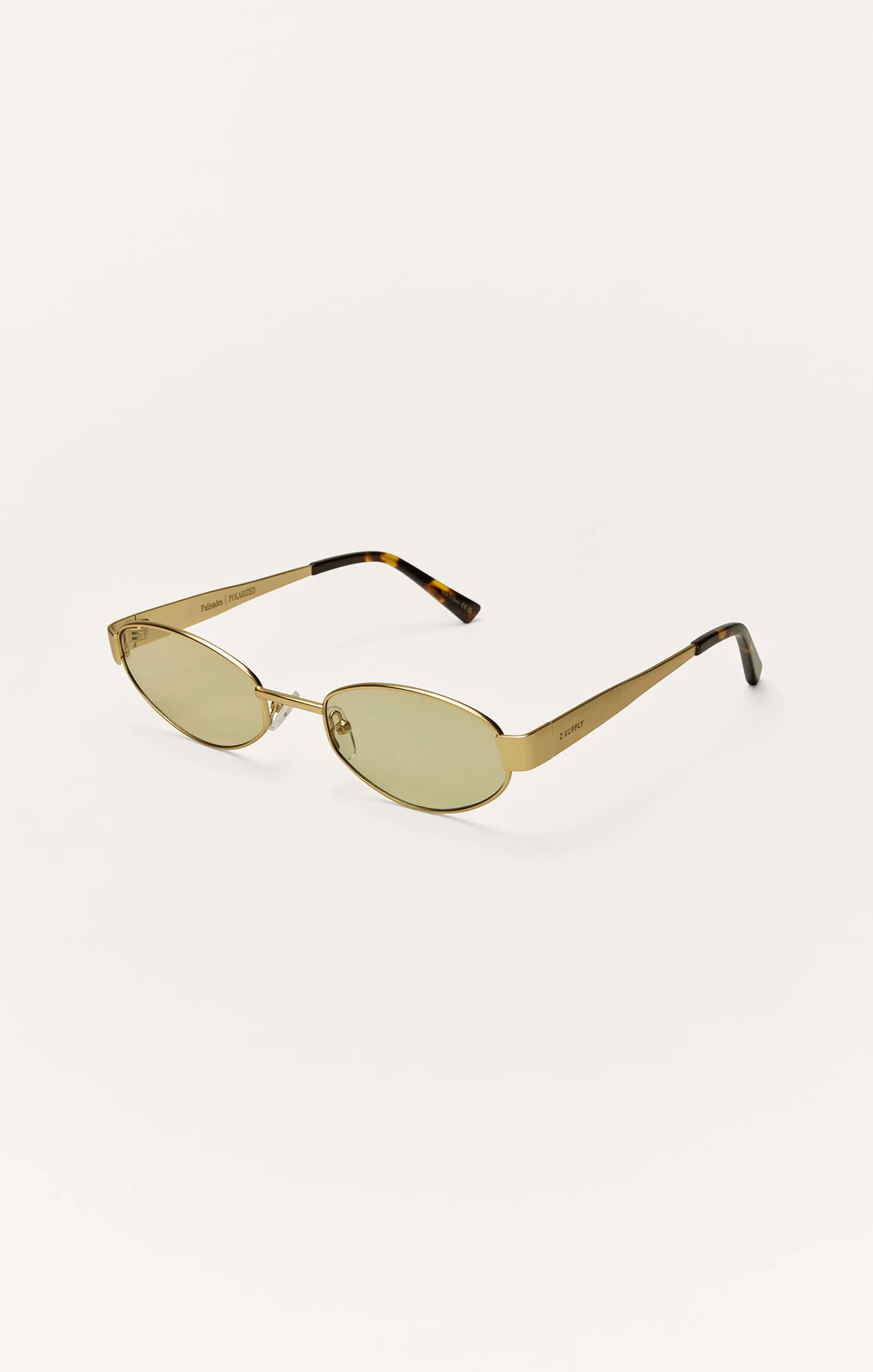 trendy women’s sunglasses, gold frame sunglasses, slim oval sunglasses, vintage inspired sunglasses, fashion sunglasses women, vacation sunglasses women, women’s polarized eyewear, cool girl sunglasses