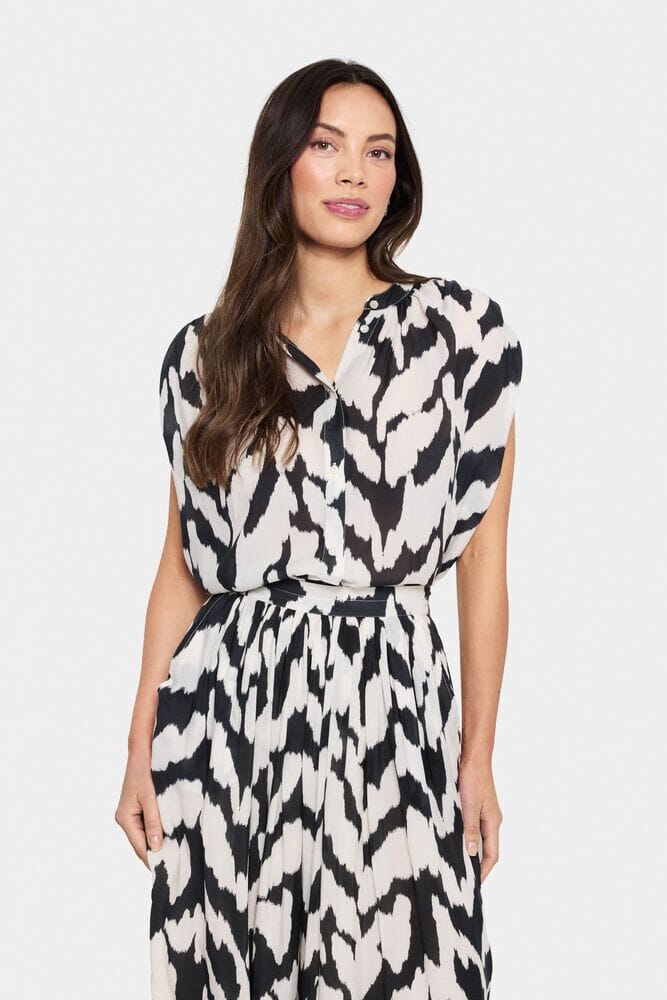 abstract print blouse, sleeveless top, lightweight blouse, statement print shirt, chic office blouse