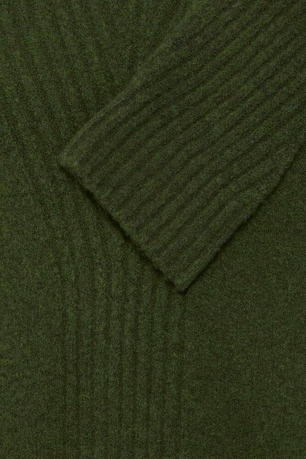 green turtleneck sweater