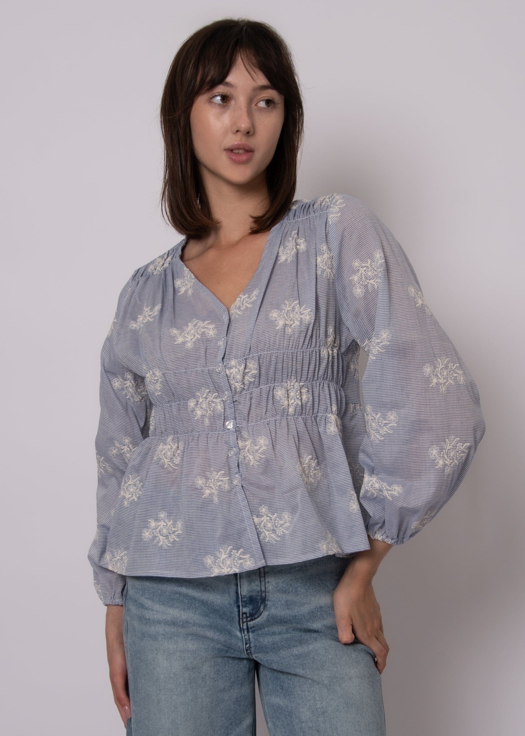 feminine peplum blouse, smocked waist top, flowy spring blouse, casual chic blouse, button front peplum top, soft printed top women, lightweight long sleeve blouse
