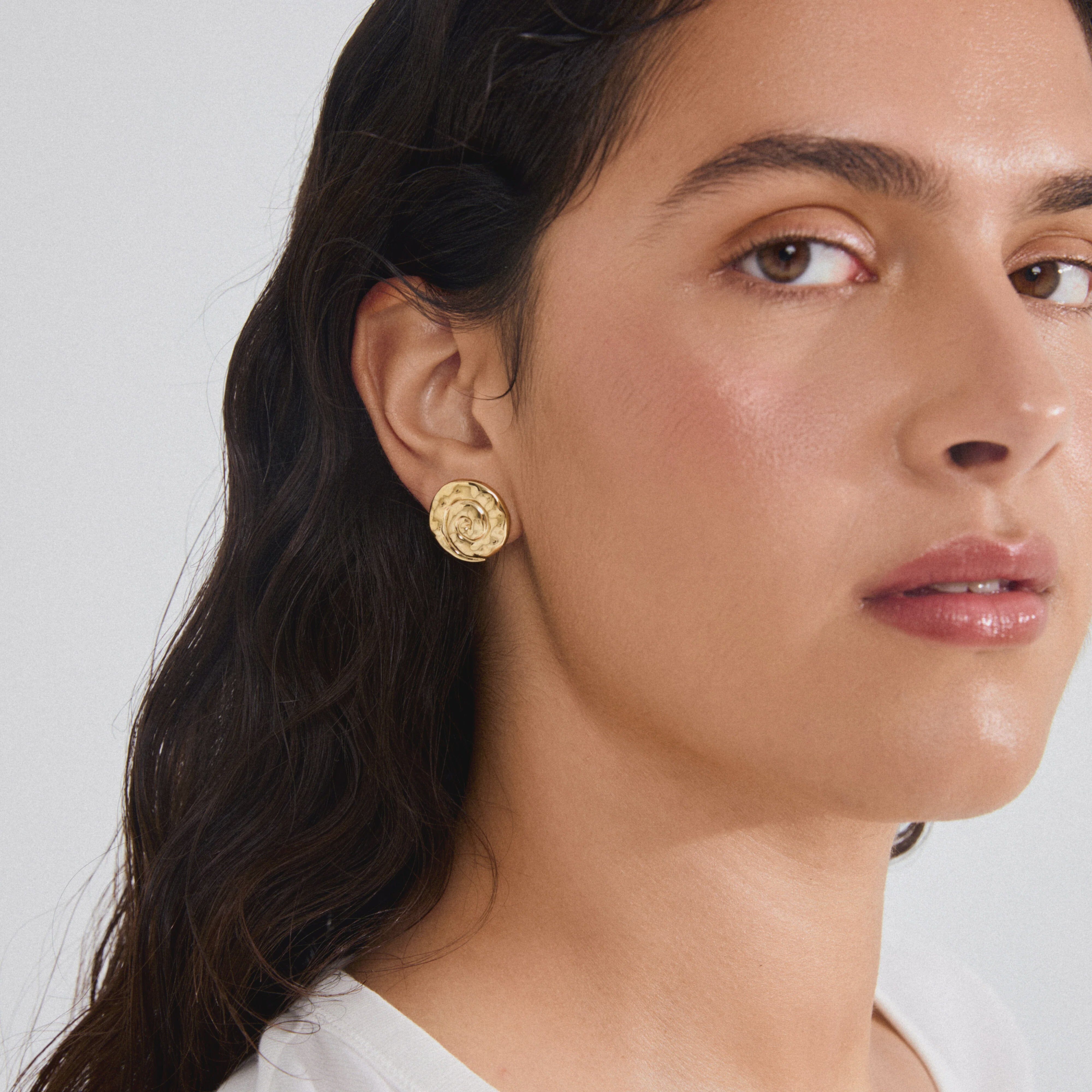 gold plated statement earrings, spiral gold earrings, sculptural gold earrings, trendy gold earrings for women, bold gold stud earrings, womens gold plated jewelry, modern statement earrings, organic shape earrings gold, vacation jewelry for women, chic gold earrings, fashion earrings for women,