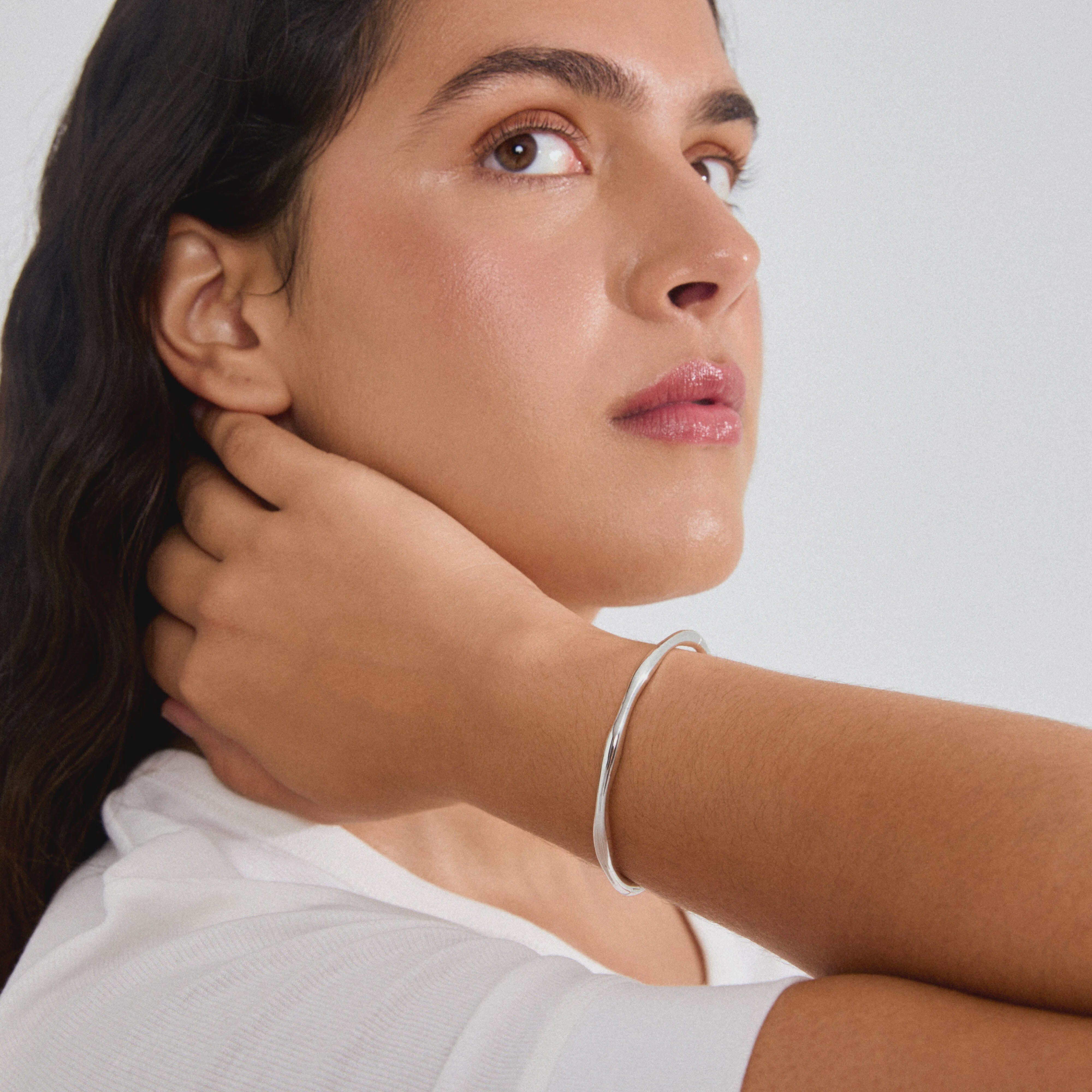 silver plated bangle, silver cuff bracelet for women, minimalist silver bracelet, organic shape silver bangle, modern silver jewelry, trendy silver bracelet, womens silver plated jewelry, silver statement bangle, polished silver bracelet, everyday silver jewelry, stackable silver bangles, silver fashion jewelry, sculptural silver bracelet