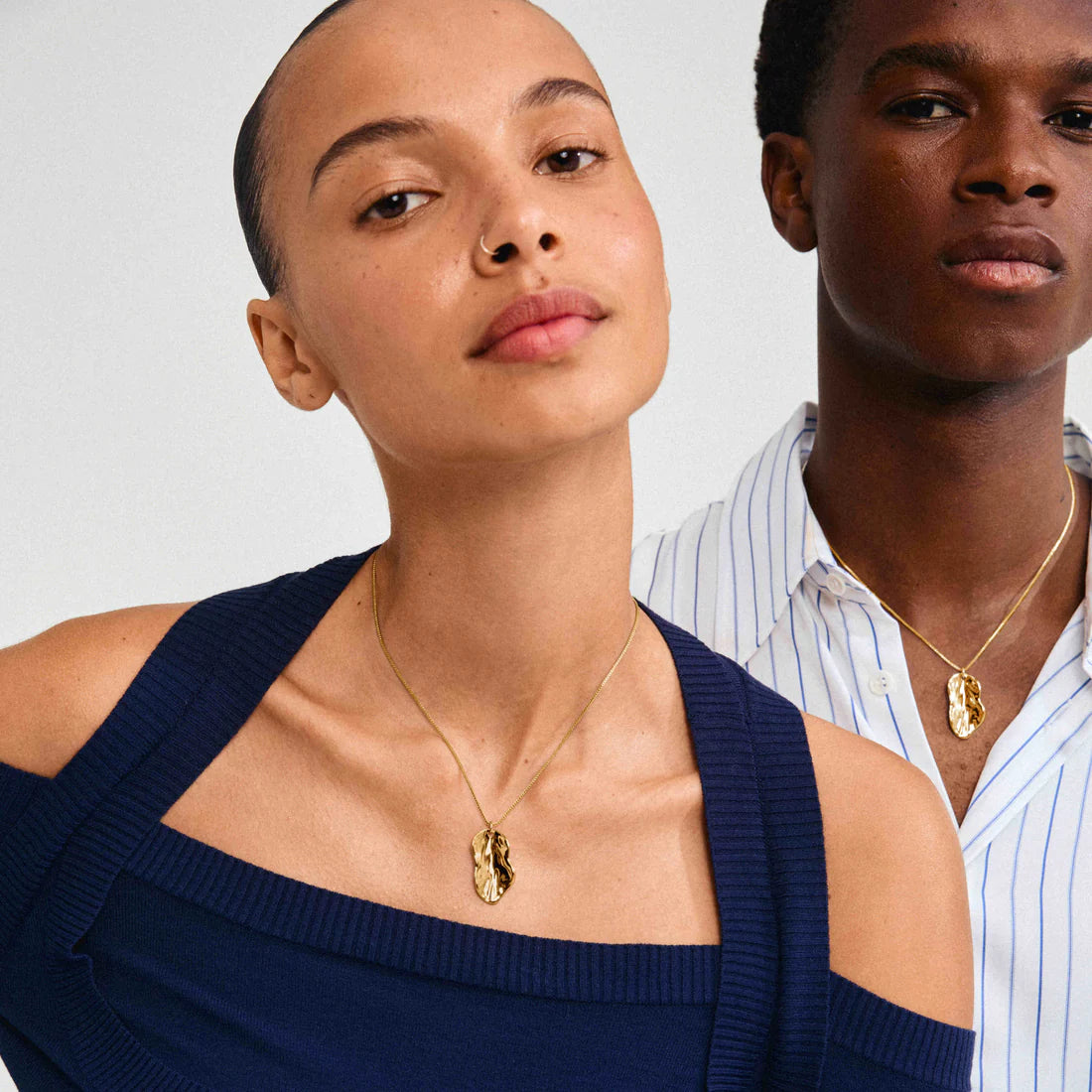 gold sculpted pendant, gold plated necklace