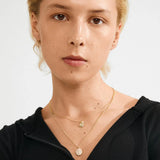 crystal gold pendant necklace, modern gold jewelry, elegant layered necklaces, dainty gold necklace set, statement gold layering jewelry