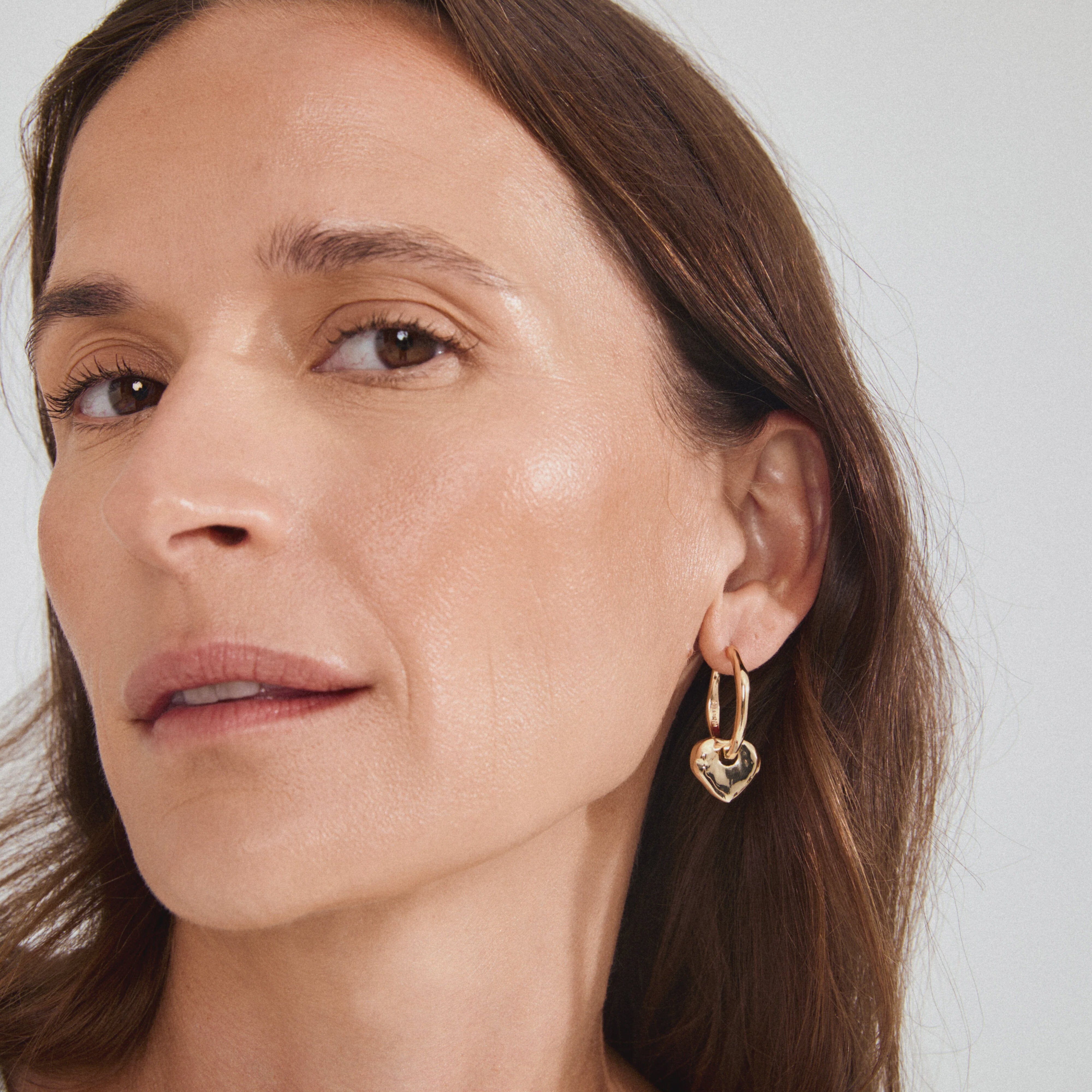 gold heart hoop earrings, heart pendant earrings, gold plated hoop earrings, trendy earrings for women, statement hoop earrings, chunky gold earrings, heart charm earrings