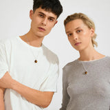 earthy jewelry, polished tiger eye pendant, minimalist silver chain, brown gemstone necklace, elegant everyday jewelry