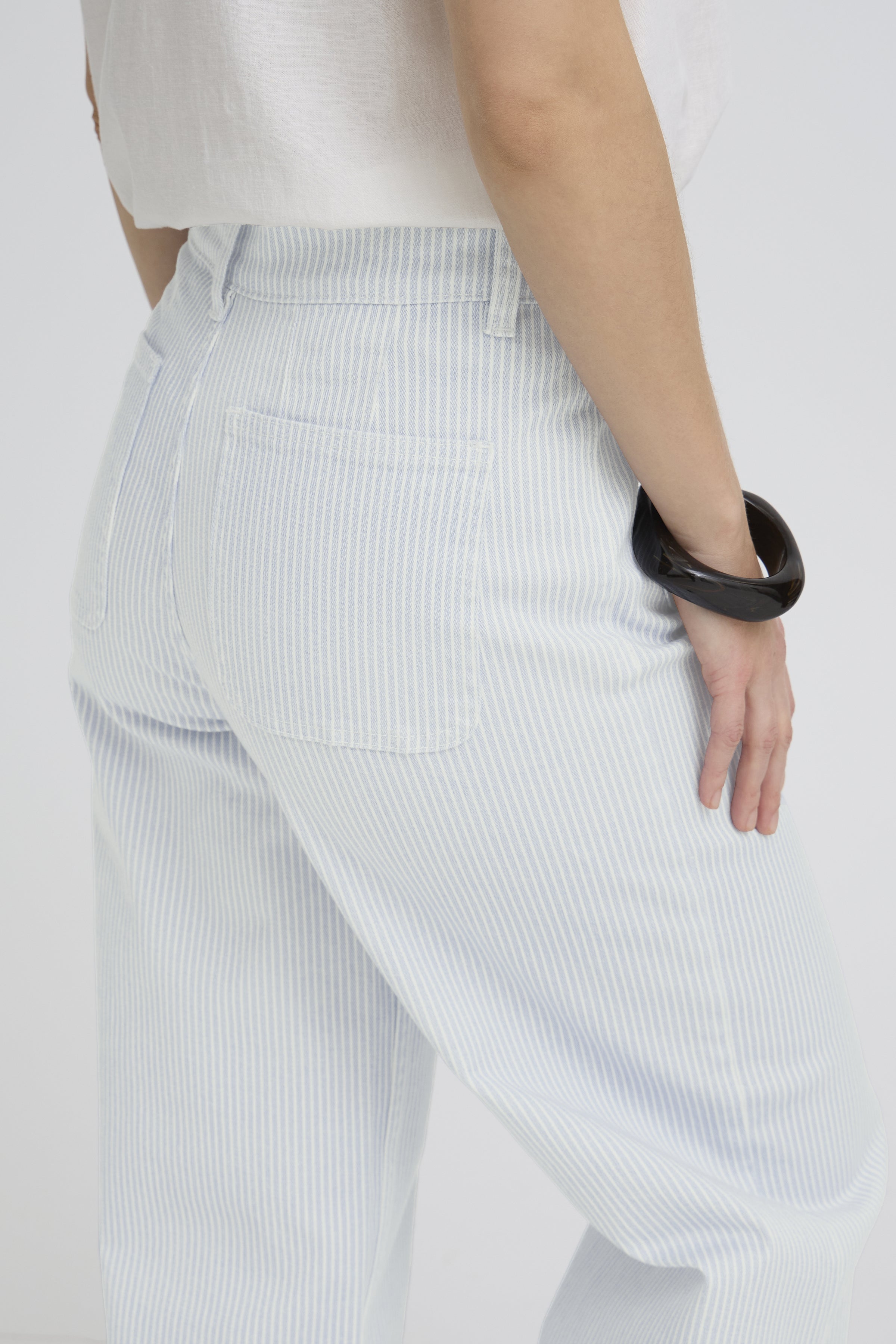 modern women’s denim, soft blue stripe pants, vacation outfit pants women
