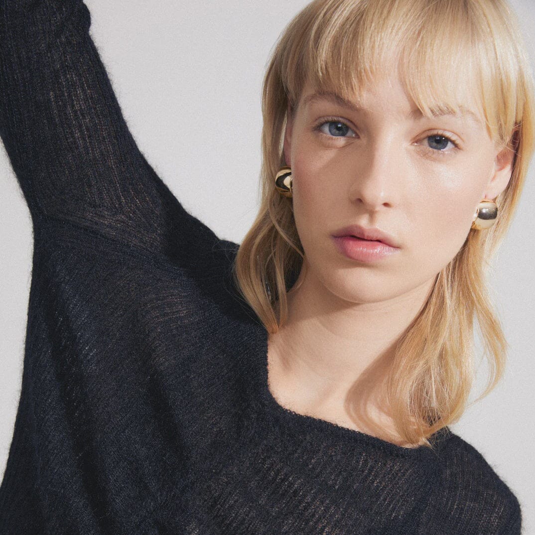 bold gold hoops, wide gold earrings, sculptural gold hoops, shiny gold accessories