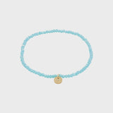 sky blue beaded bracelet, gold charm bracelet, light blue bracelet