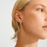 statement gold jewelry, sparkly gold earrings, crystal embellished hoops