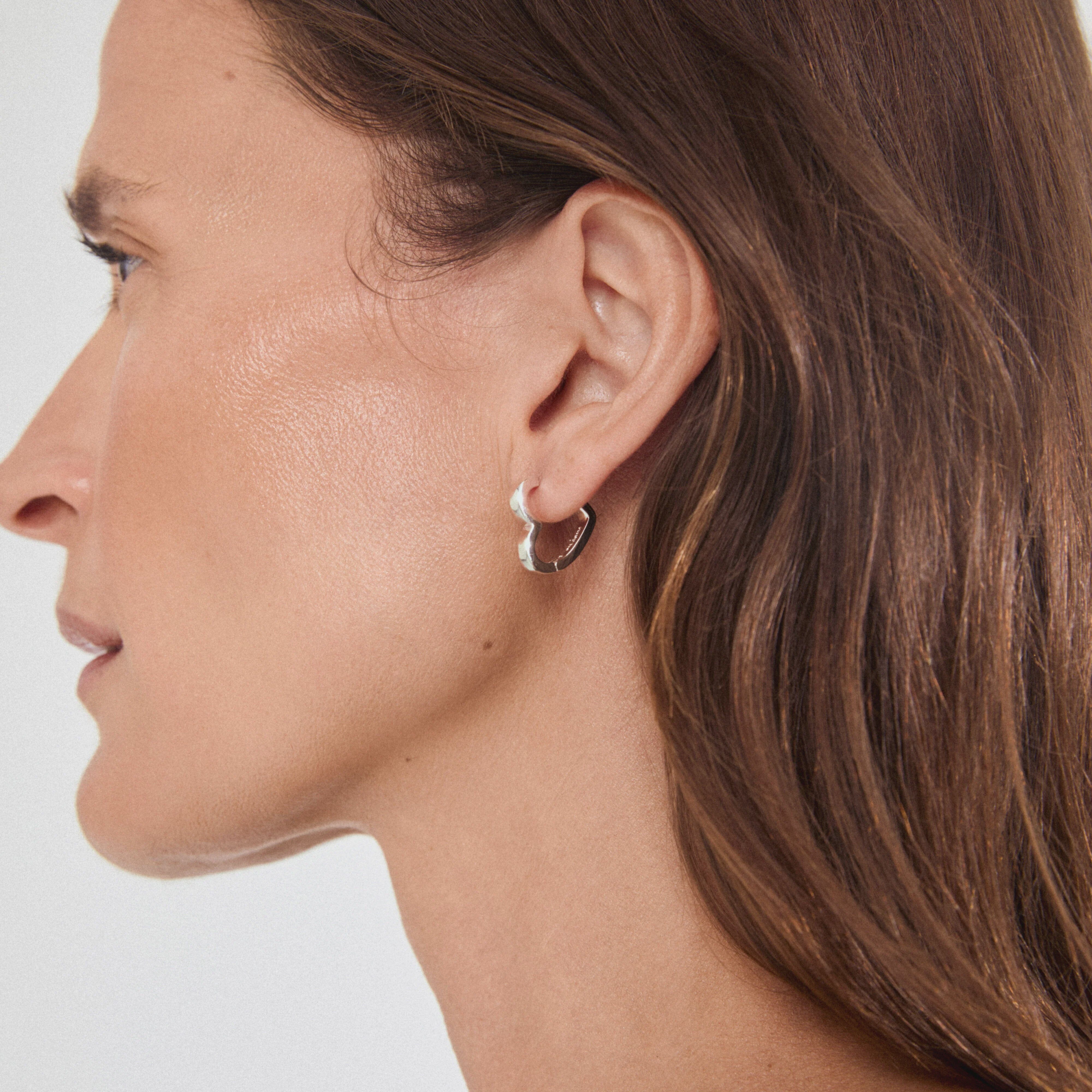 PILGRIM, silver heart hoop earrings, silver plated hoop earrings, heart shaped earrings, trendy silver earrings, womens silver jewelry, statement hoop earrings