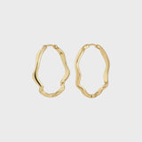 minimalist gold jewelry, modern gold hoops, organic shape earrings, elegant gold accessories, contemporary hoop design