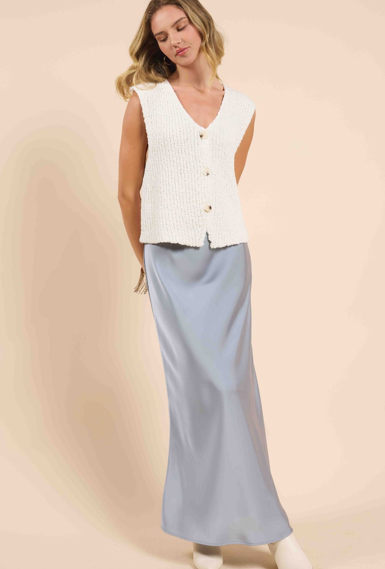 textured sweater vest, neutral layering piece