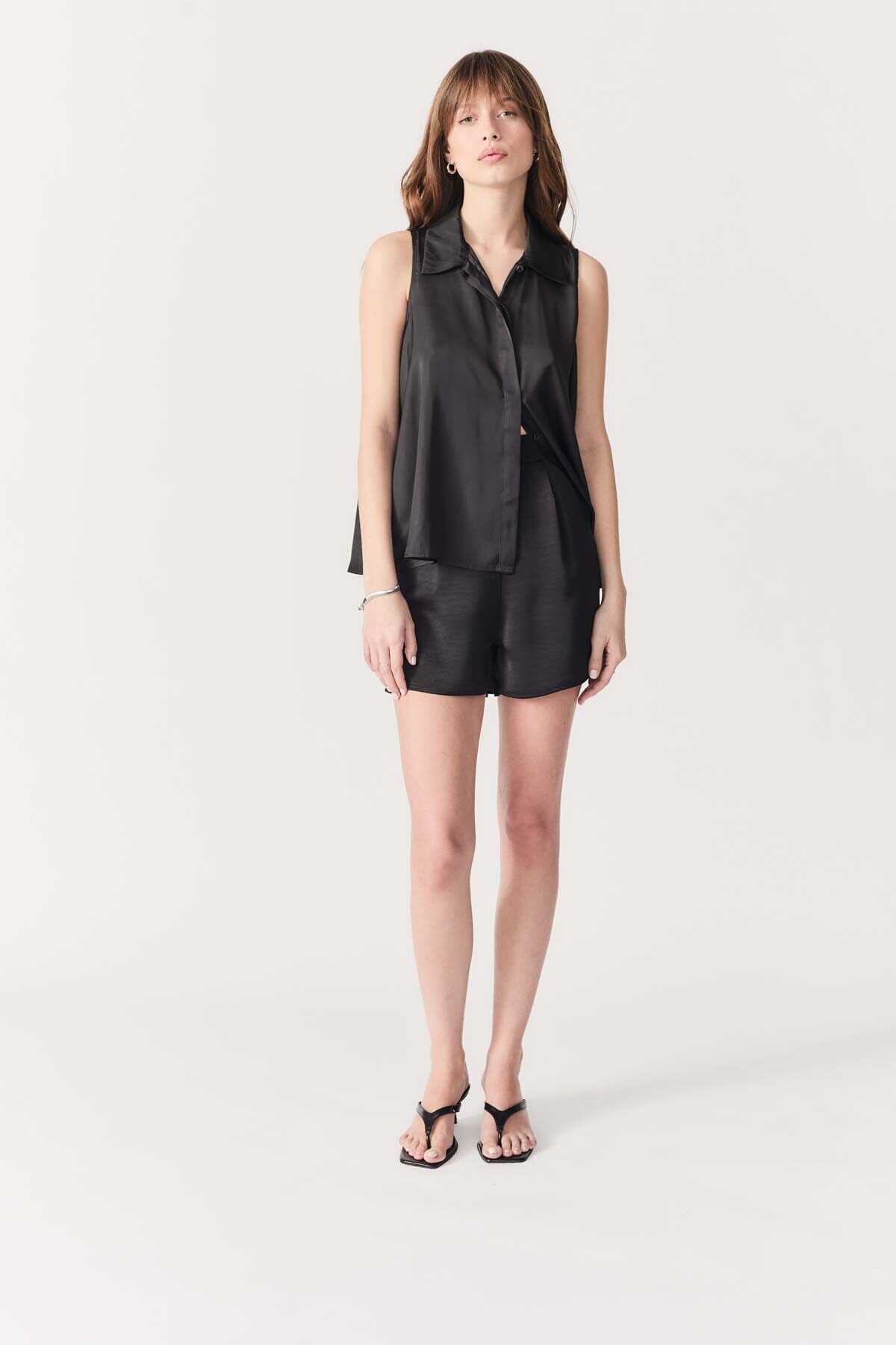minimalist black top, elegant black work shirt