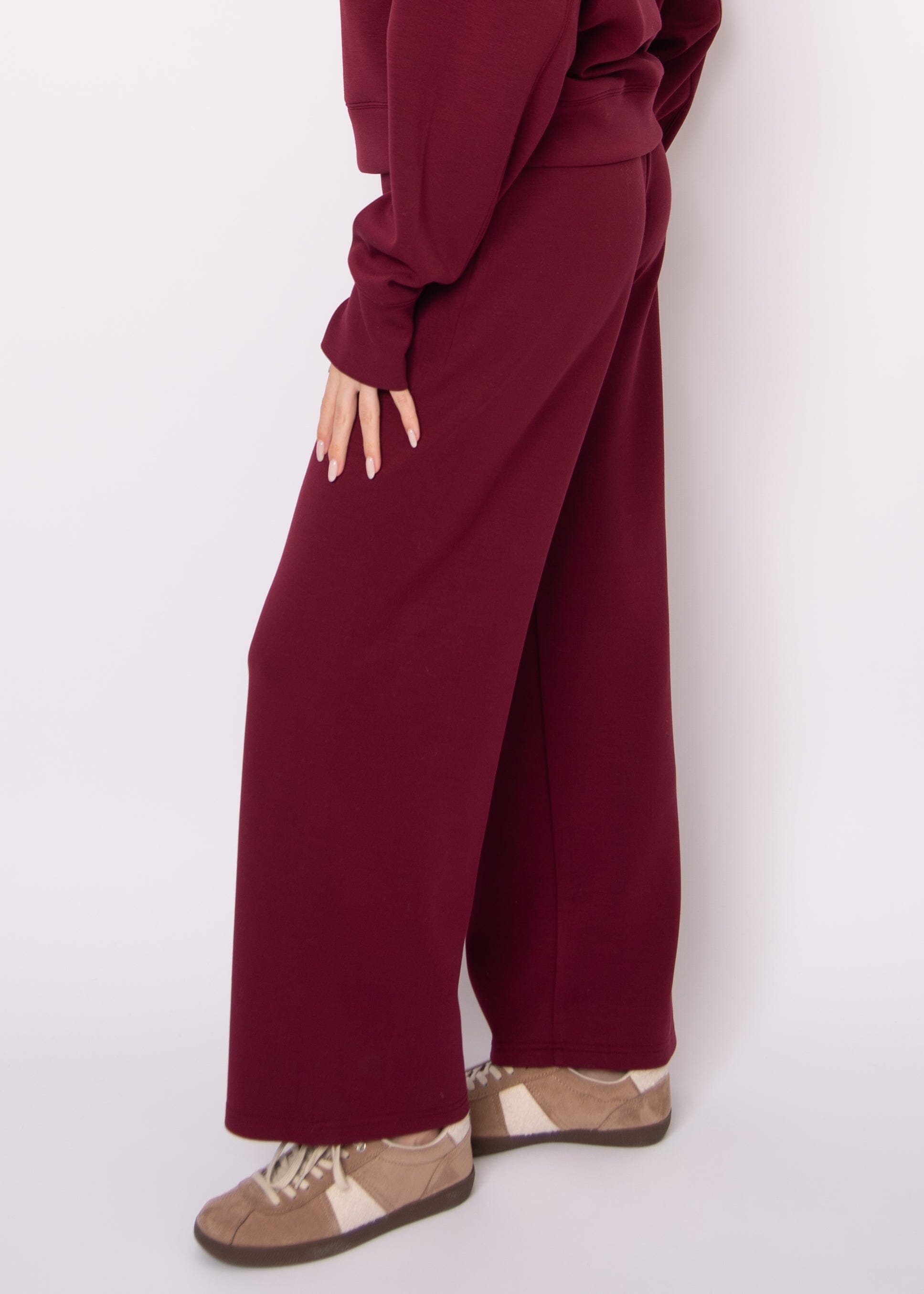 minimalist burgundy lounge pant, chic oxblood knit trousers