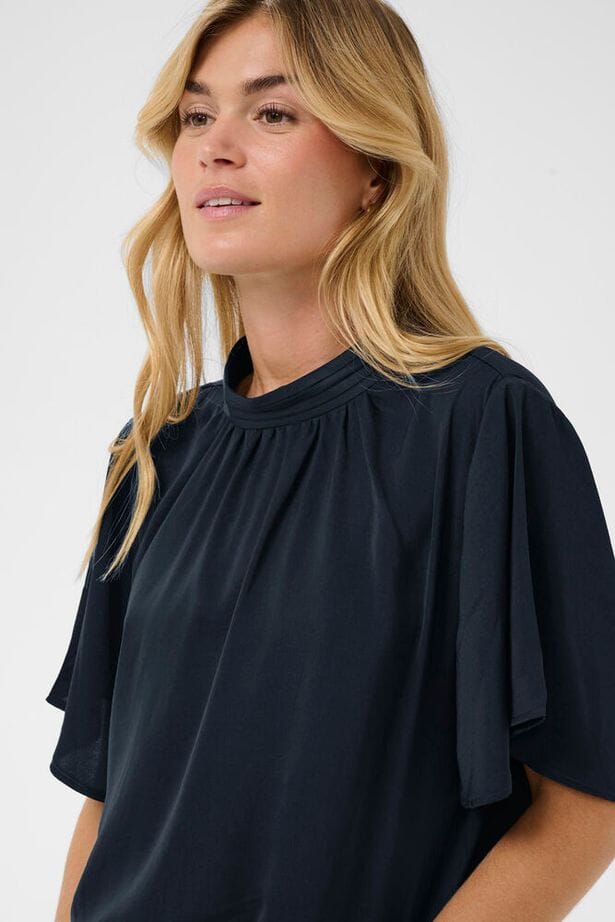 timeless black top, polished casual blouse