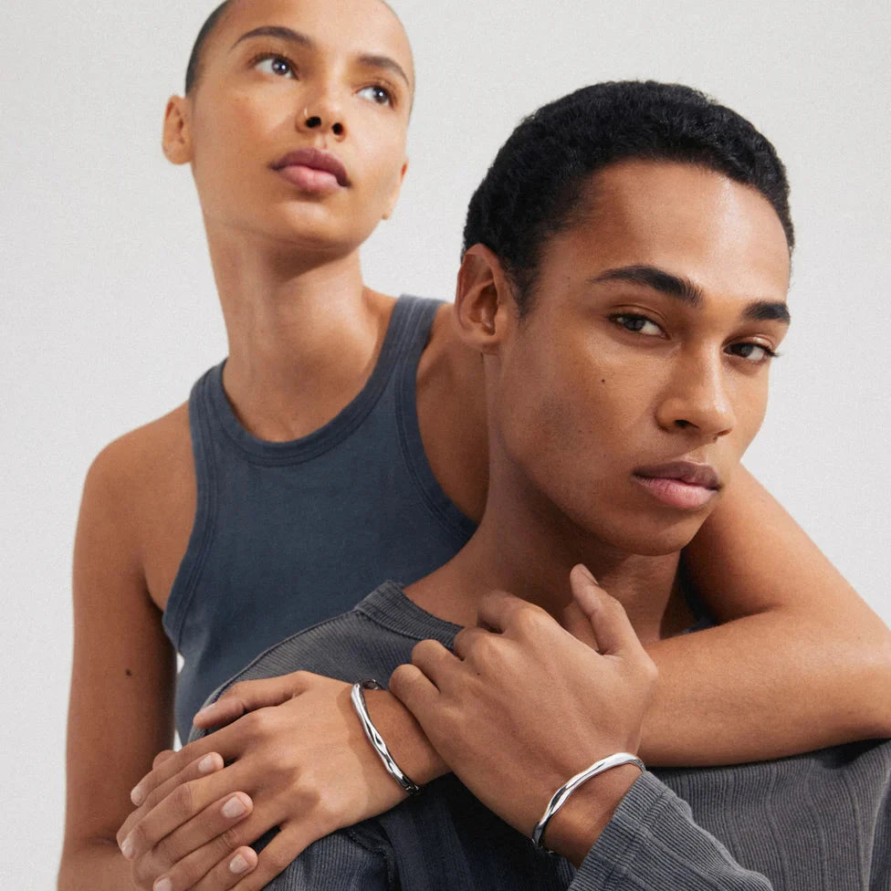 wavy silver bangle, statement silver accessory, contemporary bracelet design, everyday silver jewelry