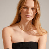 modern gold chain, statement gold piece