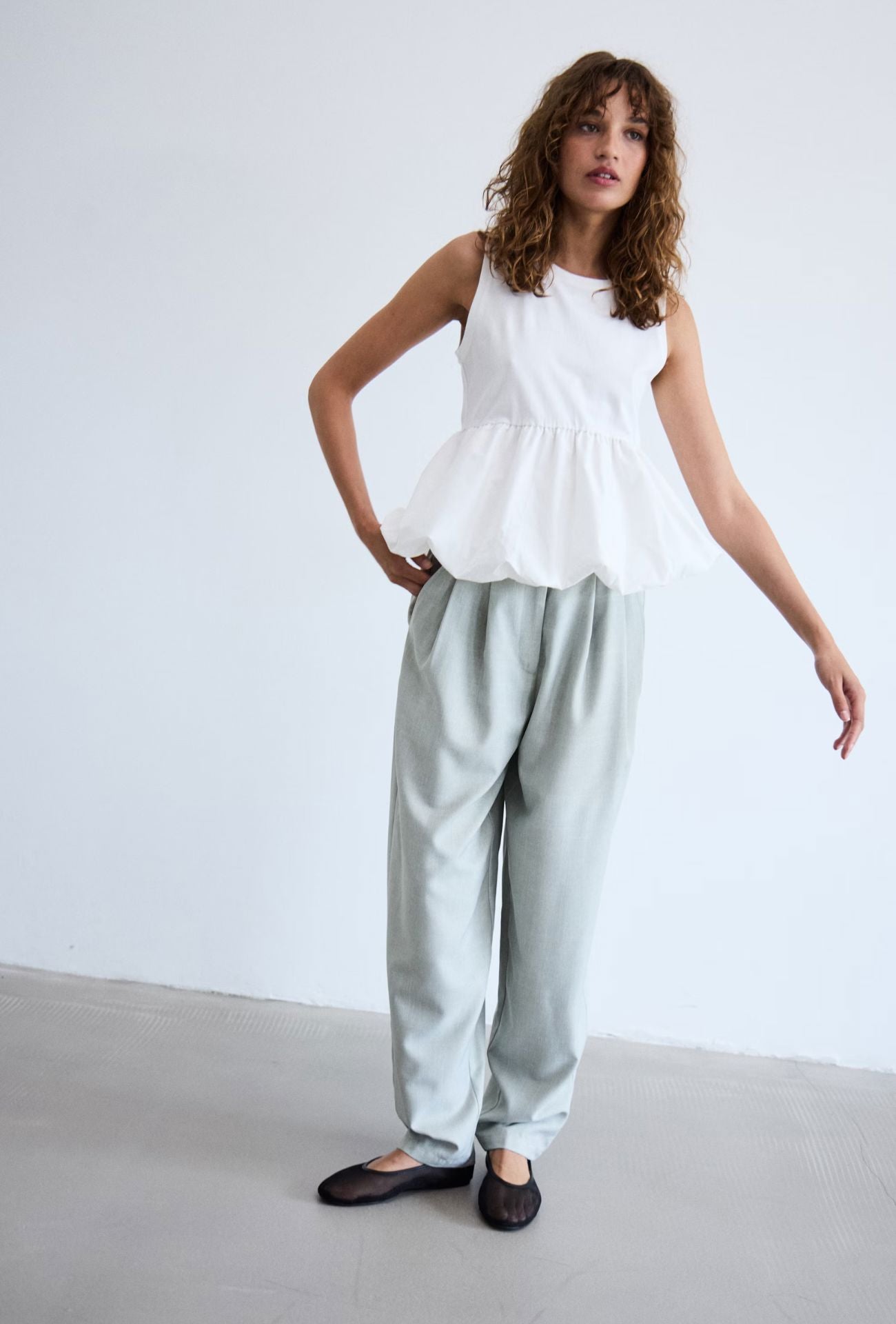 BUBBLE HEM PEPLUM TANK