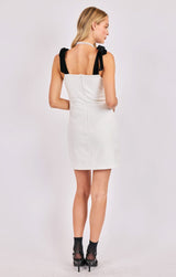 white holiday dress, black and white mini dress, bow strap mini dress, sleeveless white mini dress, white dress formal outfit, white dress for events, stylish white night out dress