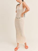 A chic and comfortable Rosemary Beige Knit Dress with a crochet style, v-neckline, and fitted silhouette.