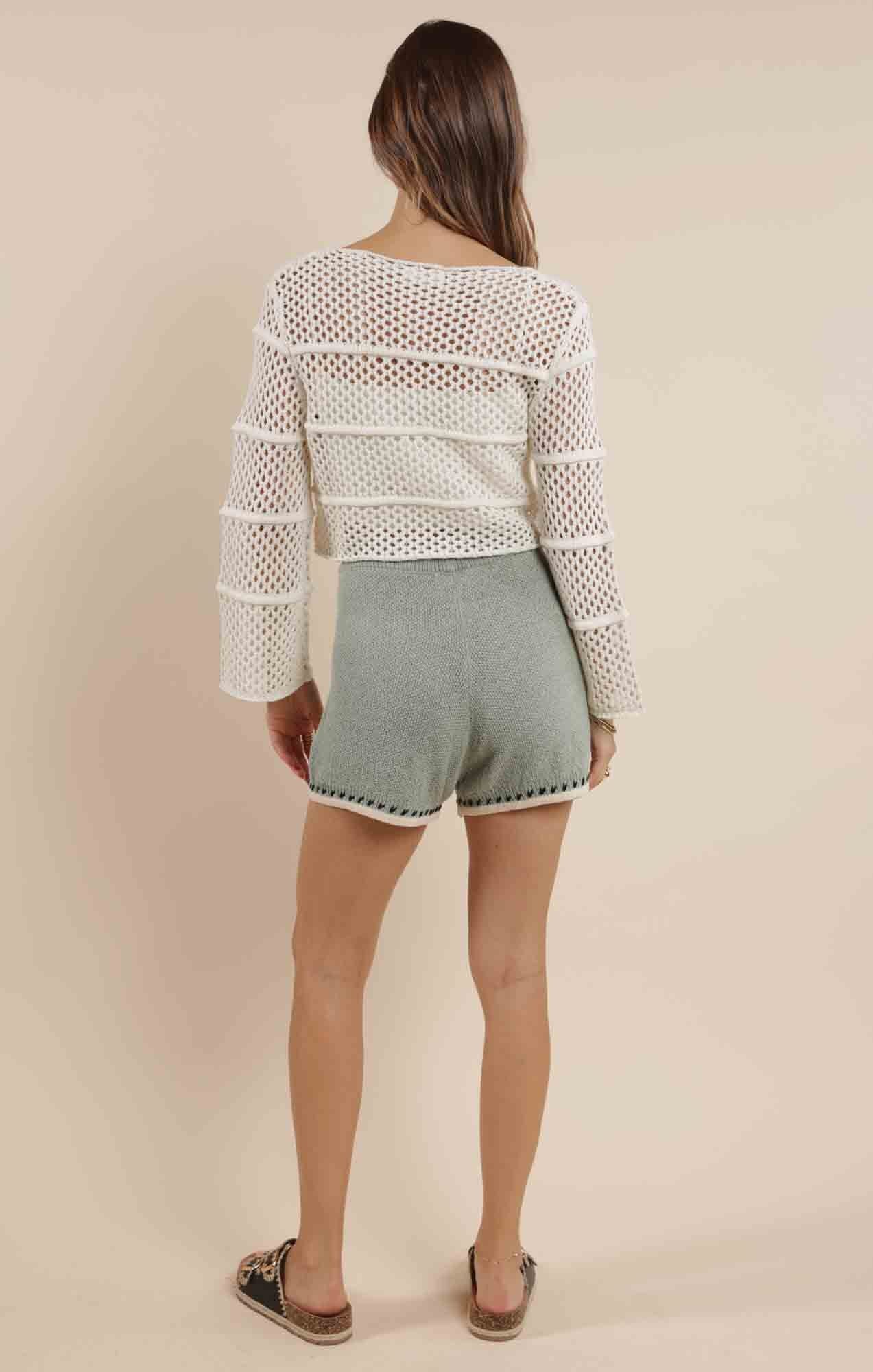 relaxed knitwear look, trendy cropped knit, soft open weave sweater