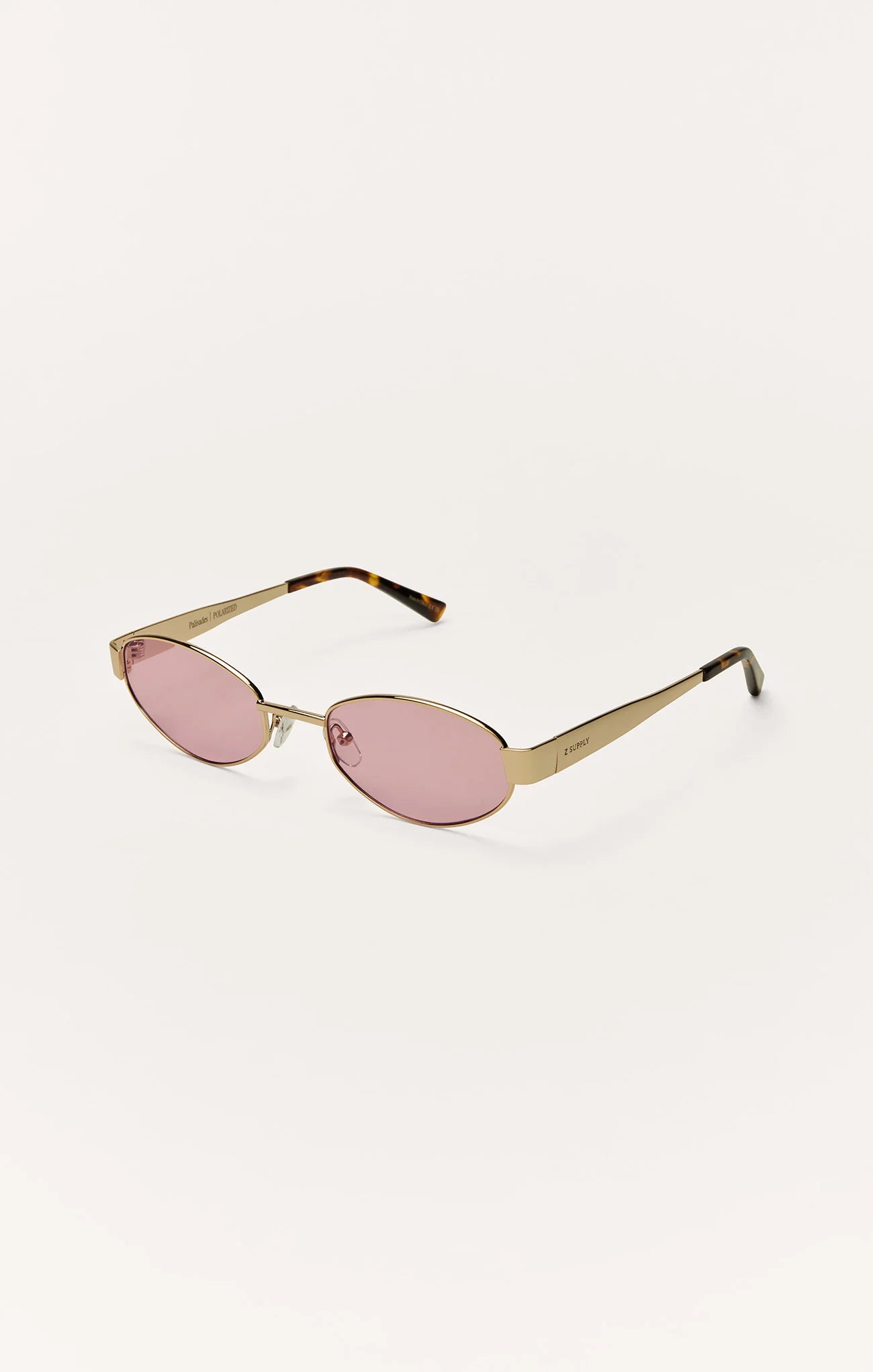 gold frame sunglasses, slim oval sunglasses, fashion sunglasses women, vacation sunglasses women, pink tinted sunglasses, women’s polarized eyewear, cool girl sunglasses