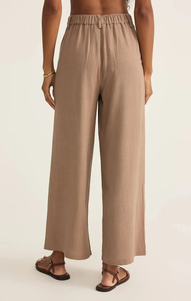relaxed neutral outfit, chic wide leg trousers