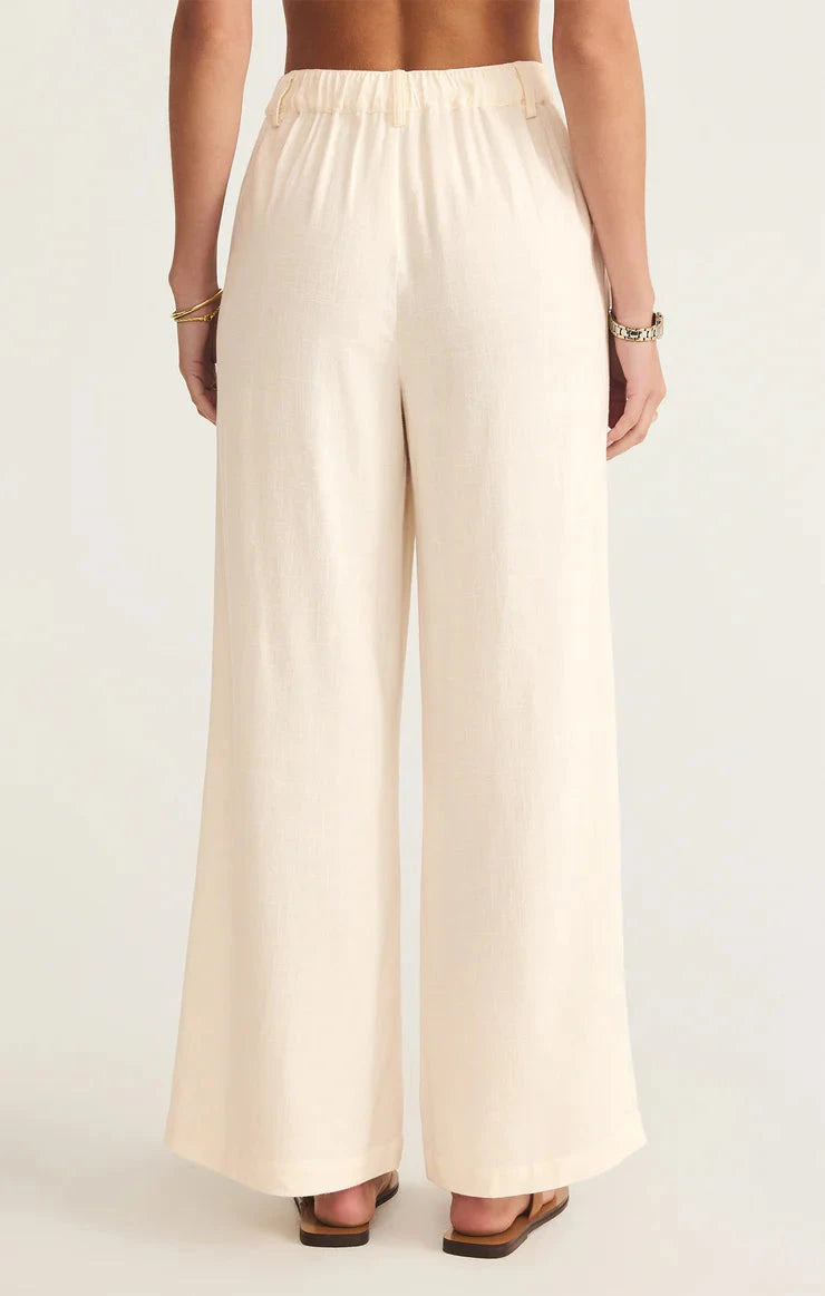 chic summer trousers, classic cream style, casual flowy outfit, effortless neutral look, wide leg cream fashion