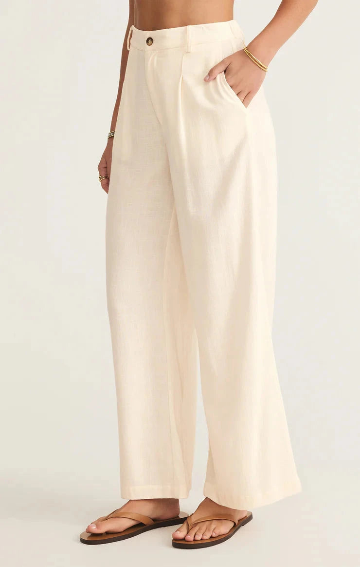 elaxed wide leg pants, minimalist neutral outfit, airy cream pants