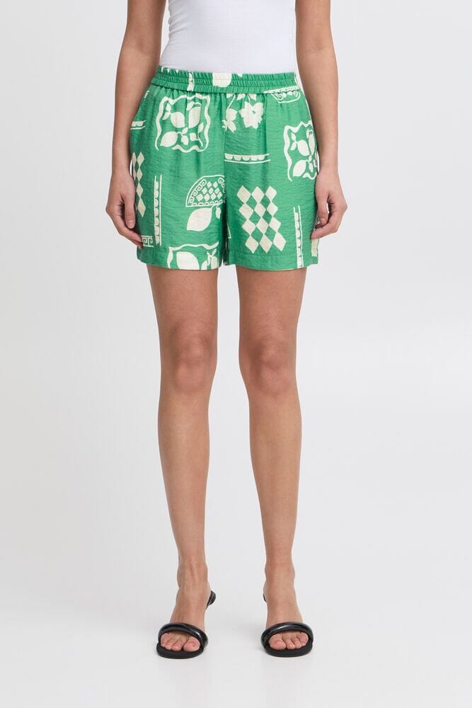 green printed shorts, resort style shorts, tropical print shorts