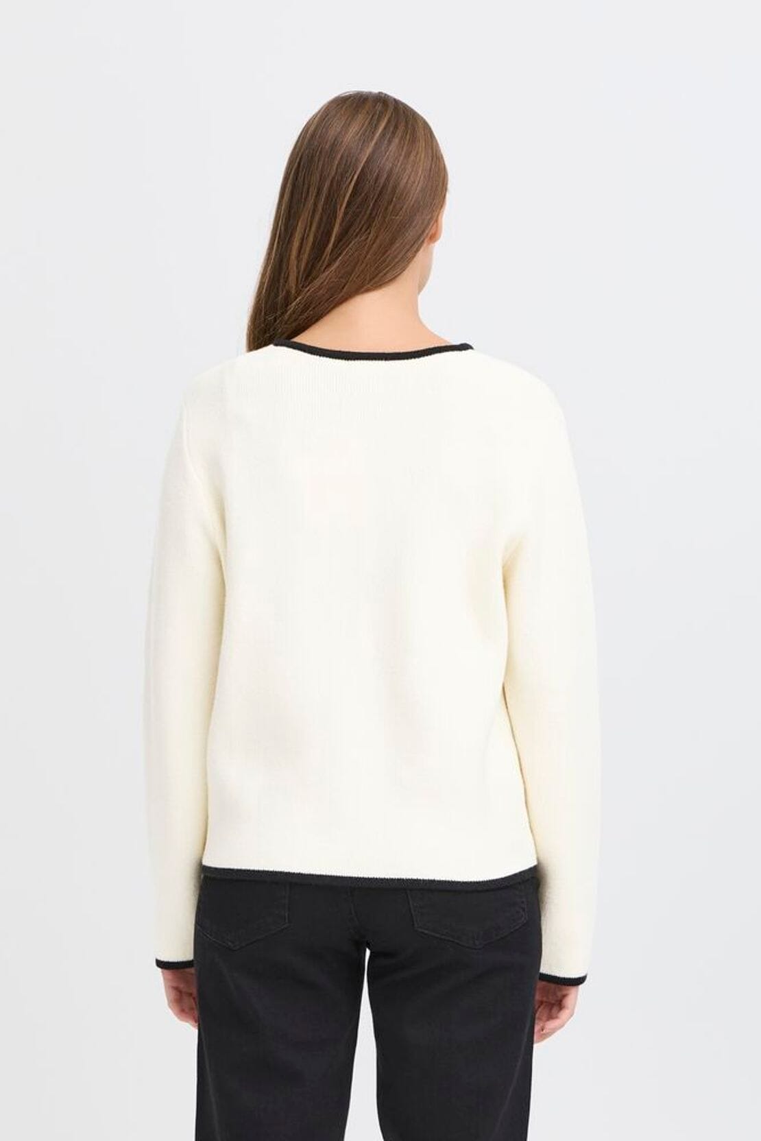 Classic ivory knit sweater with black contrast trim