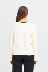 Classic ivory knit sweater with black contrast trim