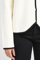 Ivory knit cardigan with black trim and button front