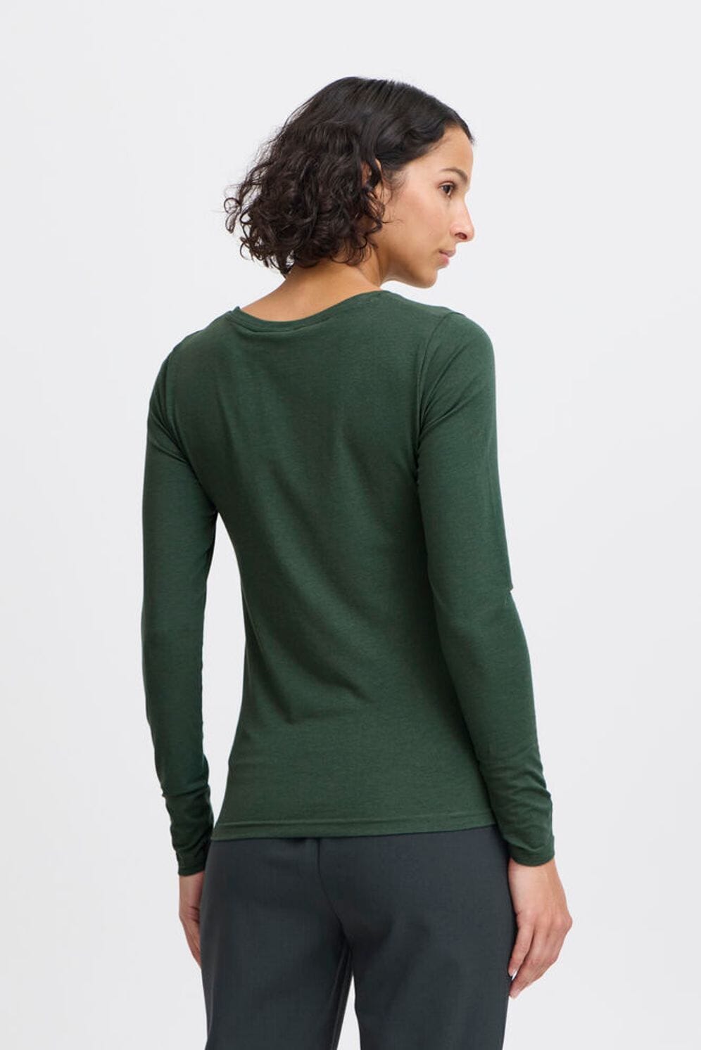 green fitted long sleeve top, deep green crew neck shirt