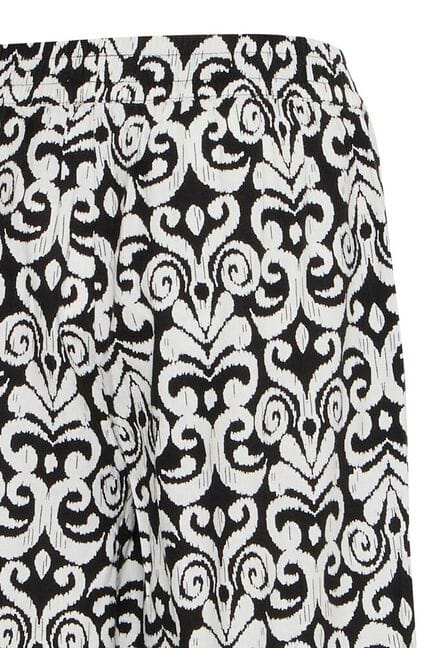 high fashion black and white look, chic office pants, lightweight patterned trousers