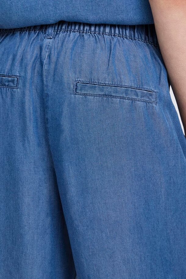 travel friendly denim pants women, polished casual blue pants women, soft chambray style trousers women, minimalist blue trousers women