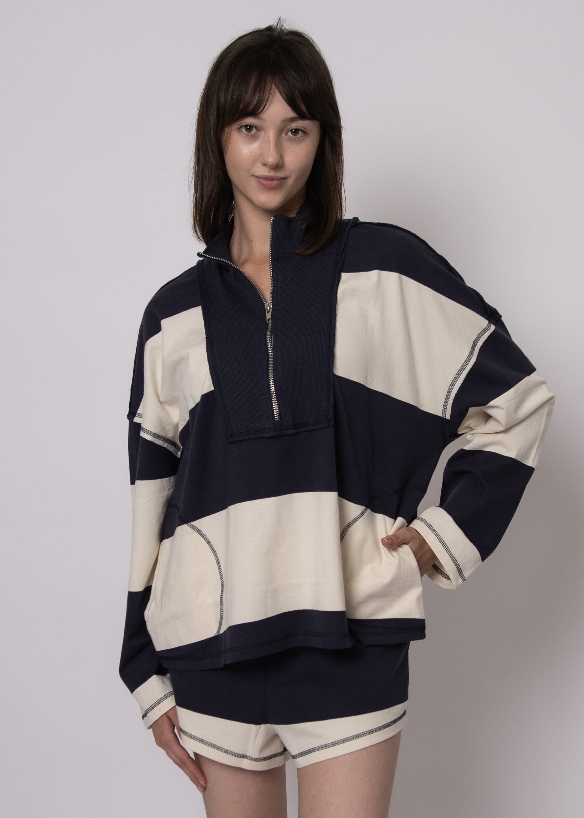 RD STYLE, varsity half zip women, oversized half zip pullover, navy striped sweatshirt women, relaxed fit half zip top, sporty chic pullover women, casual varsity style top, navy and cream half zip, everyday oversized sweatshirt women, athleisure half zip outfit, striped pullover women casual