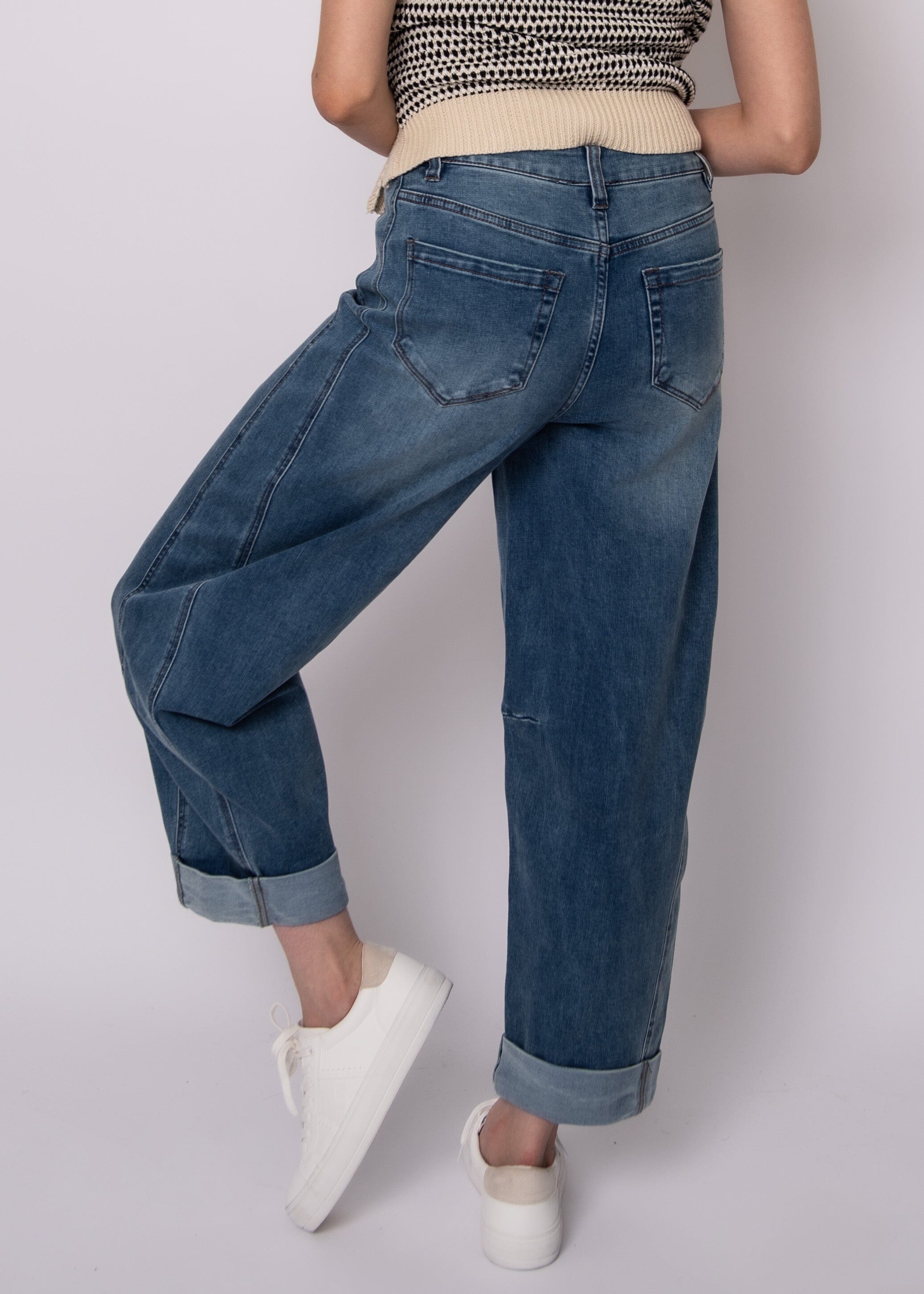 modern dark wash jeans, cuffed denim women outfit, everyday dark wash jeans, contemporary barrel leg denim, women structured denim jeans, minimalist dark denim look